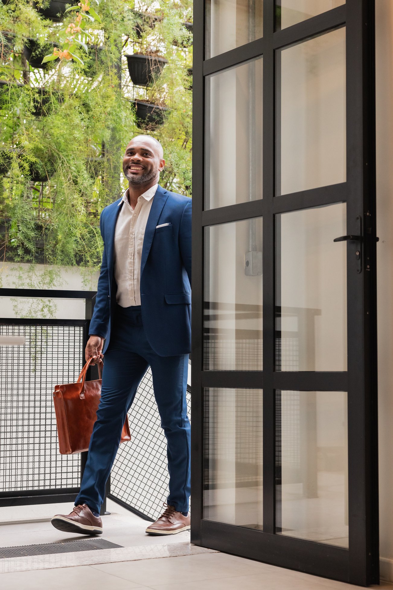 Mature Businessman Entering Office